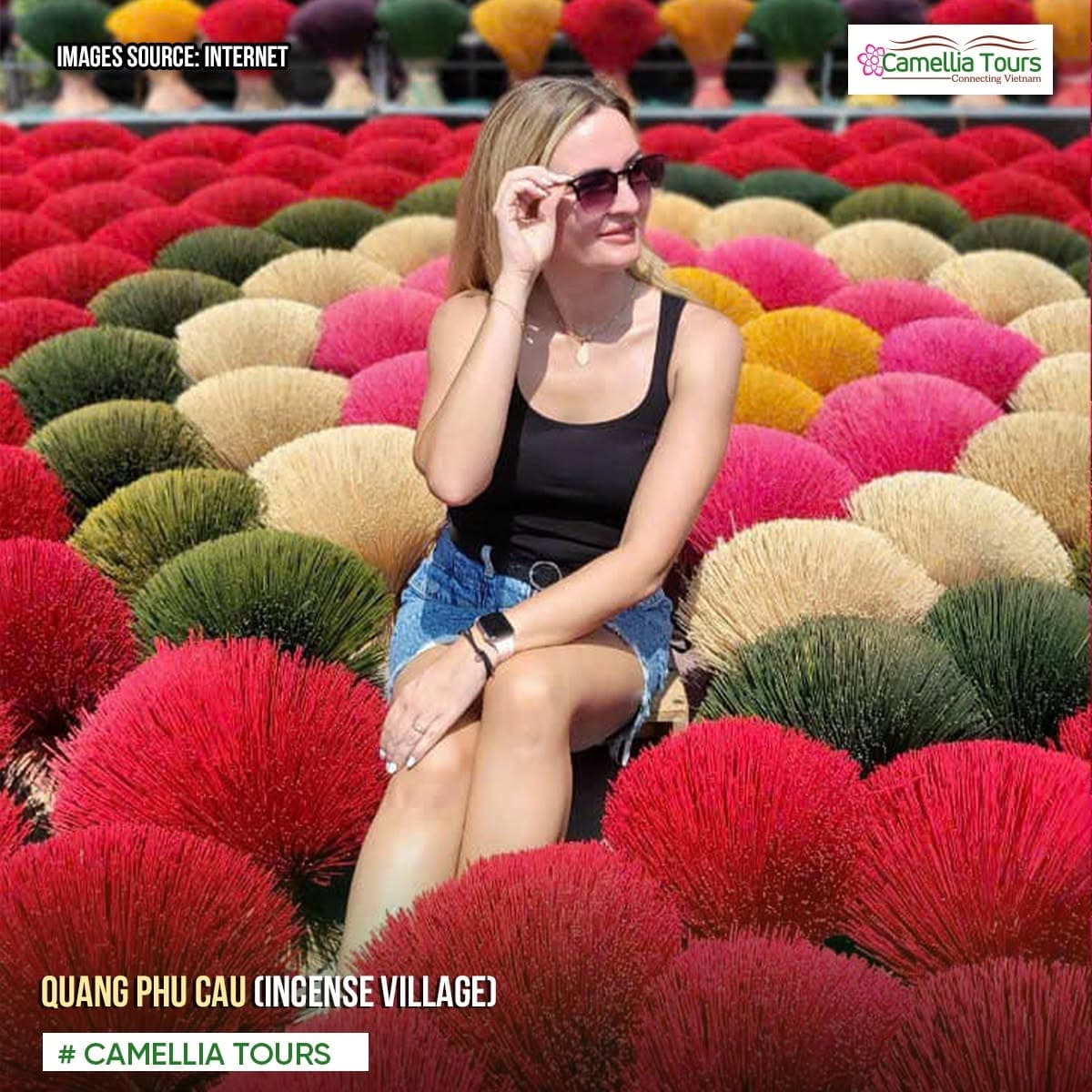Guest among colorful incense bundles at Quang Phu Cau village